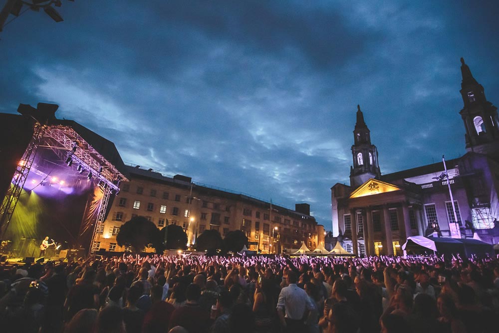 Crowd shot featuring Leeds Civic Hall and stage with Ocean Colour Scene performing at Millennium Square Summer Series (photo by Danny Payne)