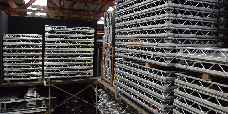 8x4 Prolyte LiteDeck stored in packs on rollers
