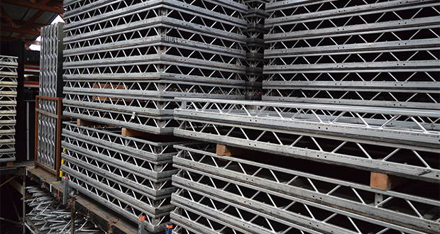 Packs of 8x4 LiteDeck in storage on rollerbed